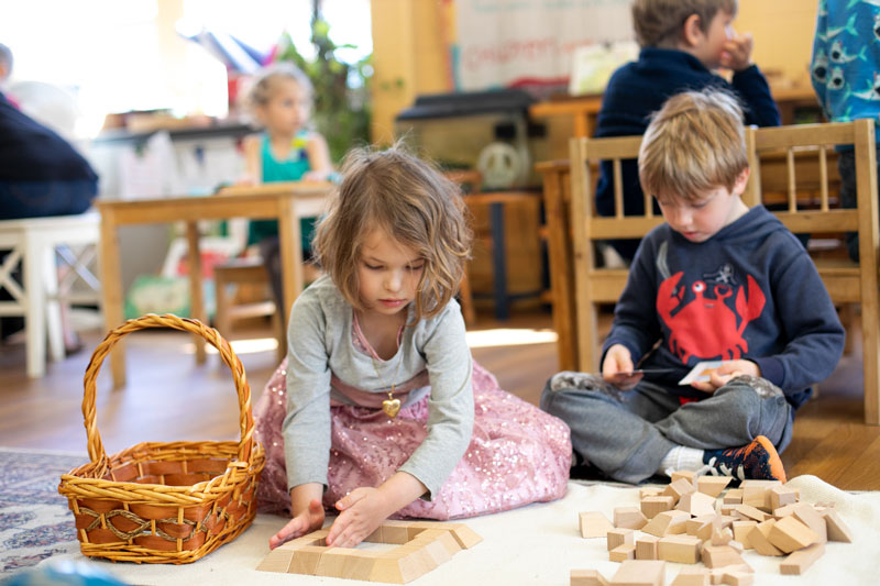 girl and boy with blocks